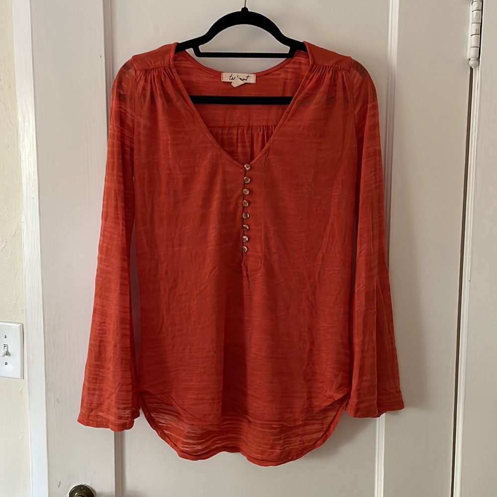 Orange long-sleeve tee with buttons